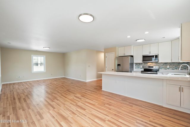 228 NE 52nd Street, Oak Island, NC 28465