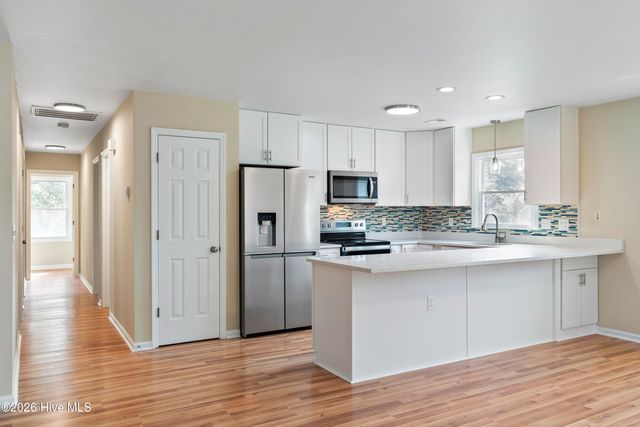 228 NE 52nd Street, Oak Island, NC 28465