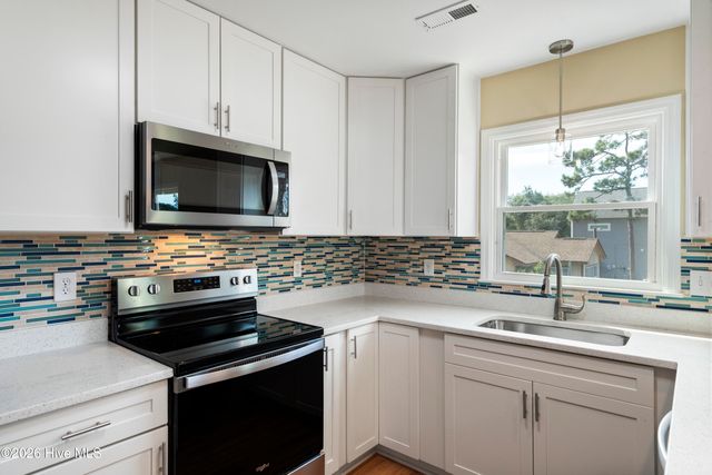 228 NE 52nd Street, Oak Island, NC 28465