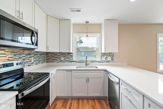 228 NE 52nd Street, Oak Island, NC 28465