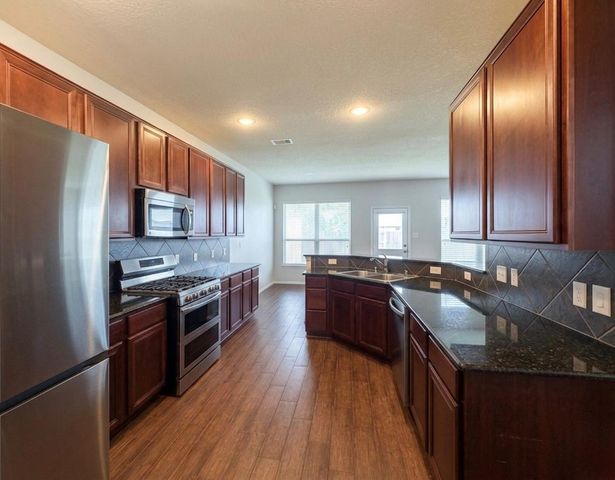 9908 Climbing Tree Street, Conroe, TX 77385
