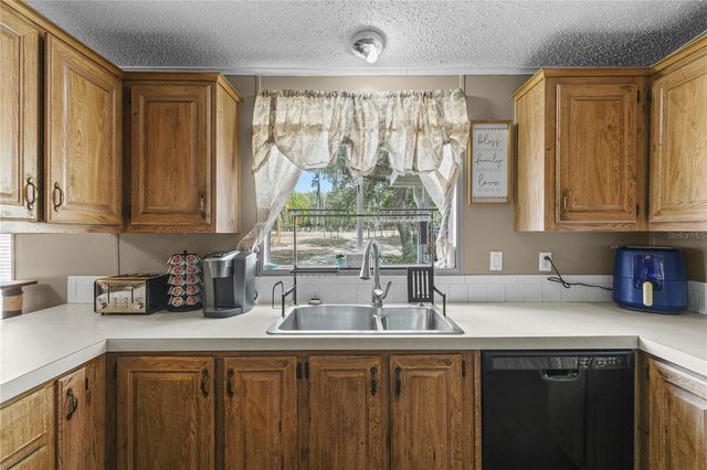 9098 LAKE HATCHINEHA ROAD, Haines City, FL 33844