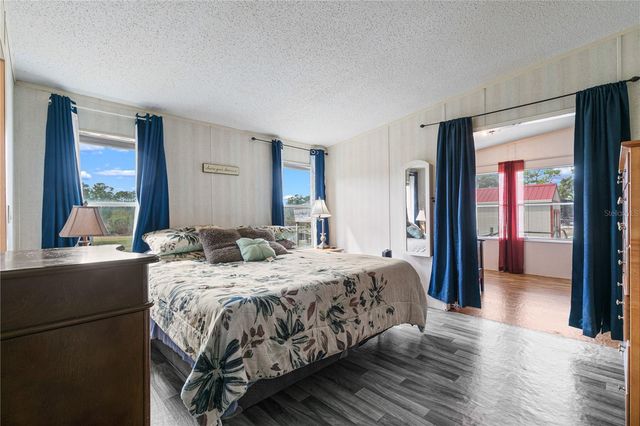 9098 LAKE HATCHINEHA ROAD, Haines City, FL 33844