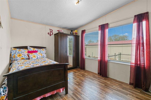 9098 LAKE HATCHINEHA ROAD, Haines City, FL 33844