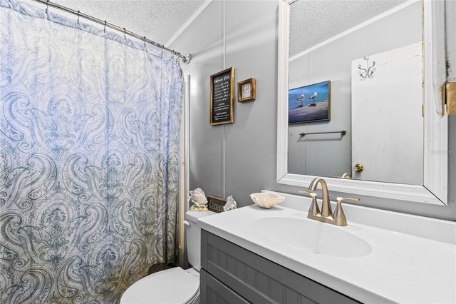 9098 LAKE HATCHINEHA ROAD, Haines City, FL 33844