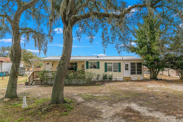 9098 LAKE HATCHINEHA ROAD, Haines City, FL 33844