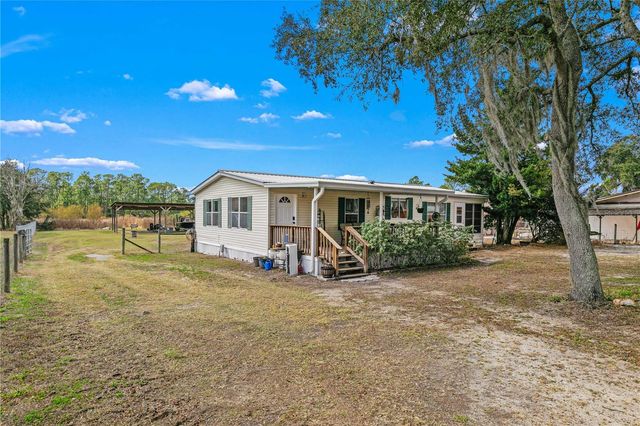 9098 LAKE HATCHINEHA ROAD, Haines City, FL 33844