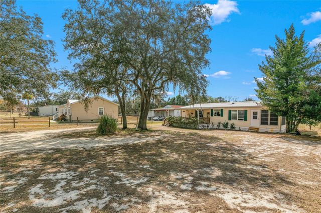 9098 LAKE HATCHINEHA ROAD, Haines City, FL 33844