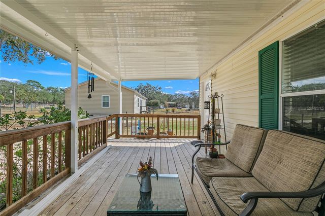 9098 LAKE HATCHINEHA ROAD, Haines City, FL 33844