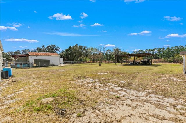 9098 LAKE HATCHINEHA ROAD, Haines City, FL 33844