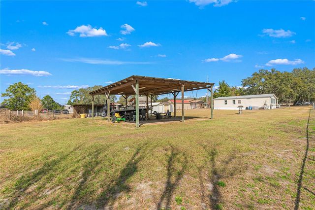 9098 LAKE HATCHINEHA ROAD, Haines City, FL 33844