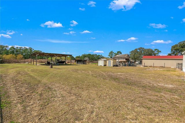 9098 LAKE HATCHINEHA ROAD, Haines City, FL 33844