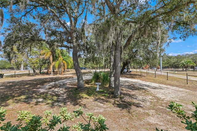 9098 LAKE HATCHINEHA ROAD, Haines City, FL 33844