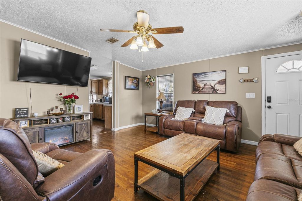 Image 2 of property listing at 9098 LAKE HATCHINEHA ROAD, Haines City, FL 33844