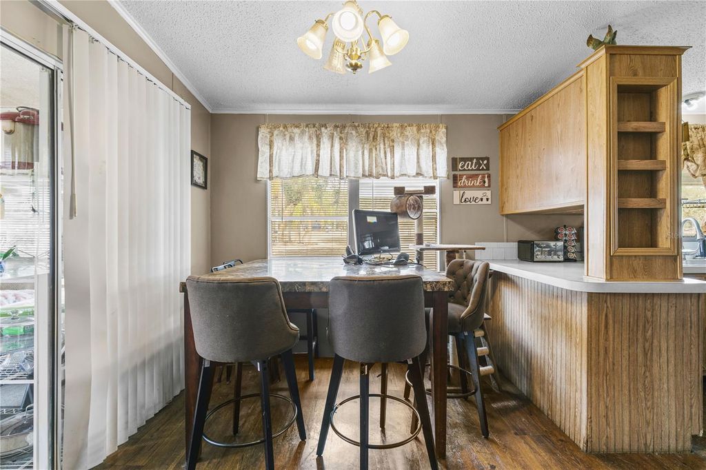 Image 11 of property listing at 9098 LAKE HATCHINEHA ROAD, Haines City, FL 33844