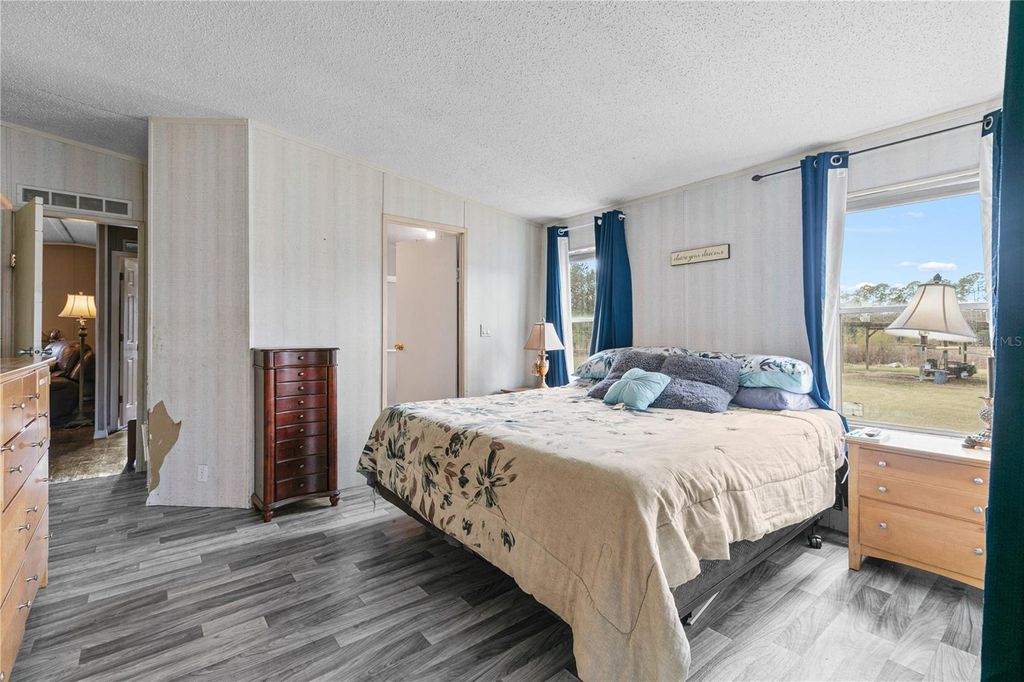 Image 14 of property listing at 9098 LAKE HATCHINEHA ROAD, Haines City, FL 33844