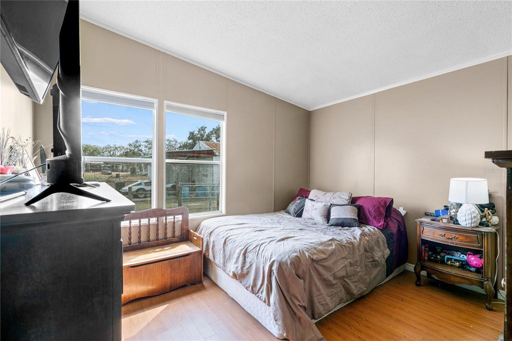 Image 16 of property listing at 9098 LAKE HATCHINEHA ROAD, Haines City, FL 33844