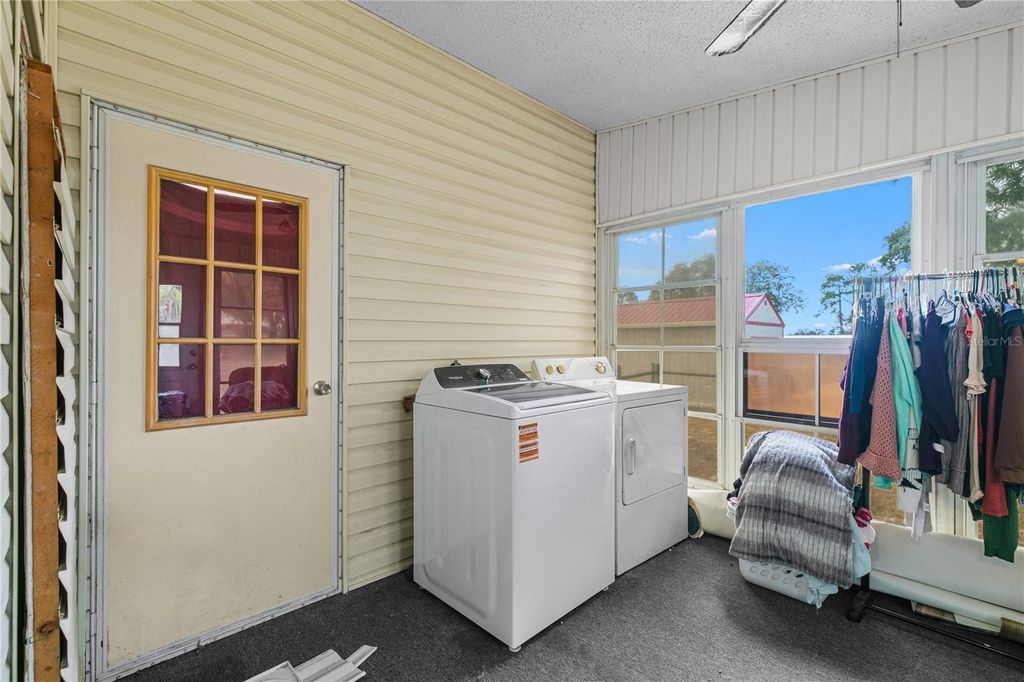 Image 19 of property listing at 9098 LAKE HATCHINEHA ROAD, Haines City, FL 33844