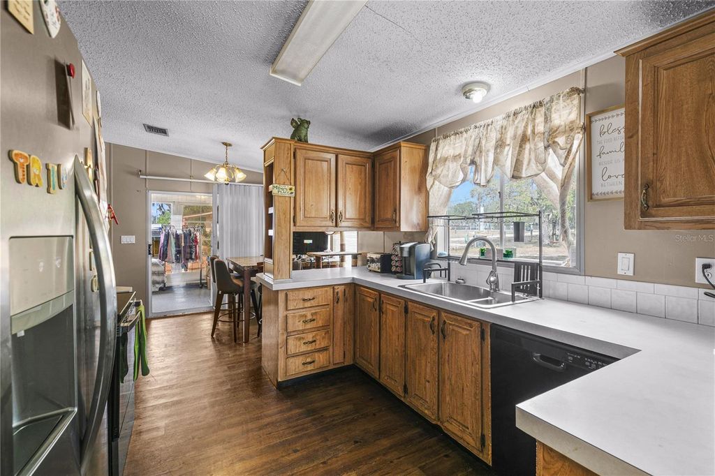 Image 3 of property listing at 9098 LAKE HATCHINEHA ROAD, Haines City, FL 33844