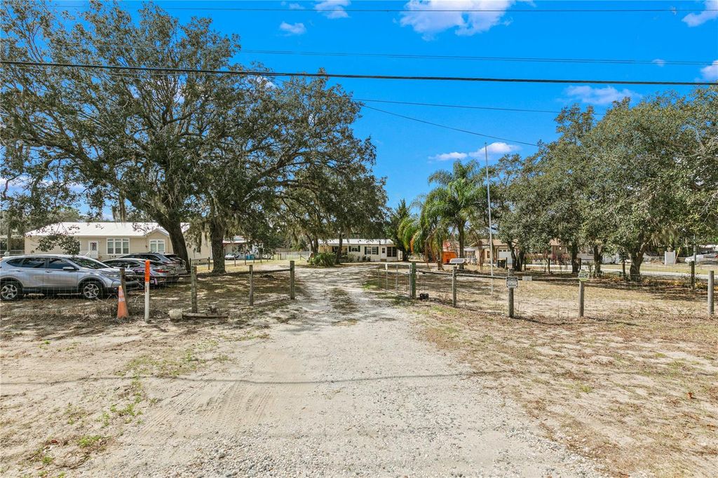 Image 23 of property listing at 9098 LAKE HATCHINEHA ROAD, Haines City, FL 33844