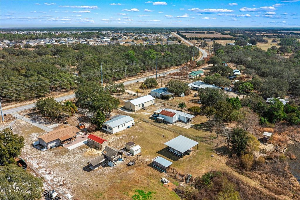 Image 24 of property listing at 9098 LAKE HATCHINEHA ROAD, Haines City, FL 33844