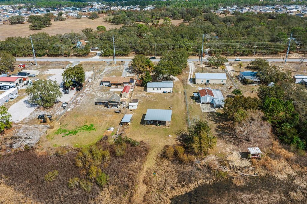 Image 27 of property listing at 9098 LAKE HATCHINEHA ROAD, Haines City, FL 33844