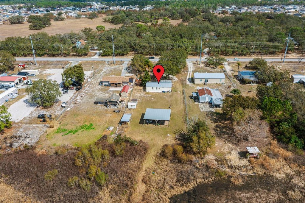 Image 28 of property listing at 9098 LAKE HATCHINEHA ROAD, Haines City, FL 33844