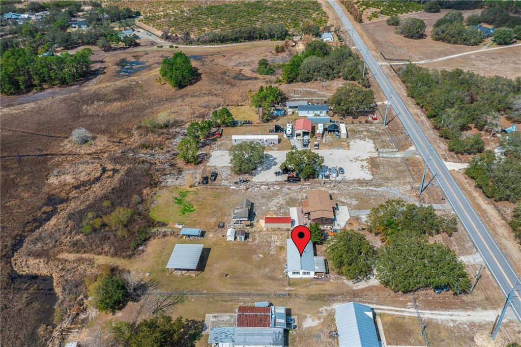 Image 30 of property listing at 9098 LAKE HATCHINEHA ROAD, Haines City, FL 33844