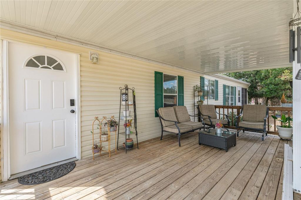 Image 4 of property listing at 9098 LAKE HATCHINEHA ROAD, Haines City, FL 33844