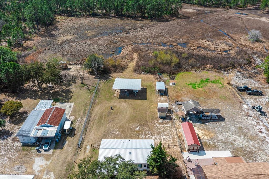 Image 31 of property listing at 9098 LAKE HATCHINEHA ROAD, Haines City, FL 33844