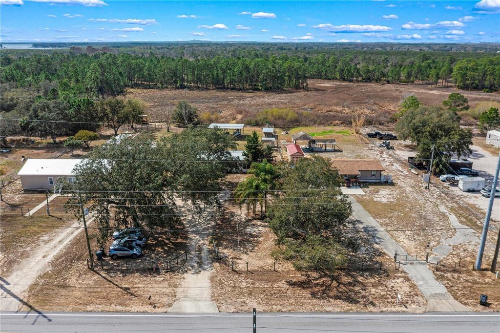 Image 32 of property listing at 9098 LAKE HATCHINEHA ROAD, Haines City, FL 33844