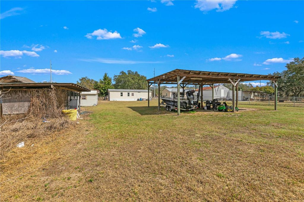 Image 34 of property listing at 9098 LAKE HATCHINEHA ROAD, Haines City, FL 33844