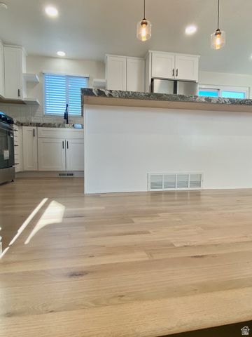 1440 W COUNTRYWOOD LN, West Jordan, UT 84088
