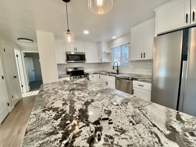 1440 W COUNTRYWOOD LN, West Jordan, UT 84088