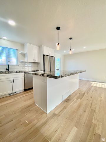 1440 W COUNTRYWOOD LN, West Jordan, UT 84088
