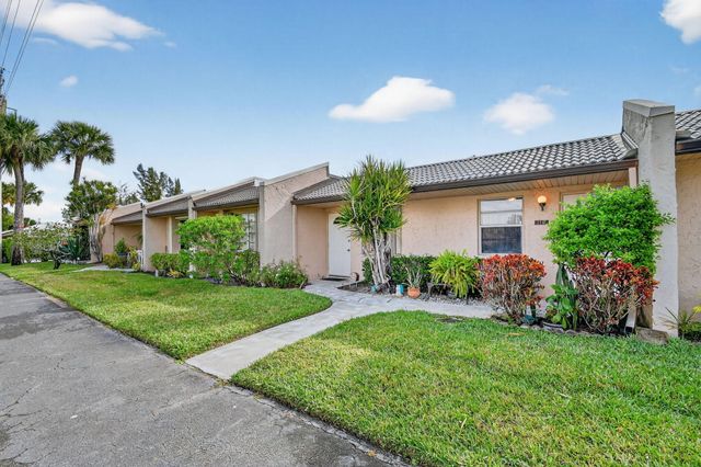 116 Golden Lakes Boulevard, West Palm Beach, FL 33411