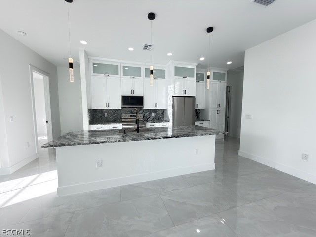 913 Glenn AVE, Lehigh Acres, FL 33972