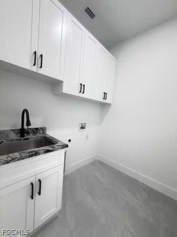 913 Glenn AVE, Lehigh Acres, FL 33972