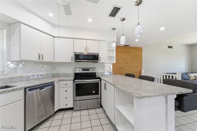 4 E Greens CIR, Lehigh Acres, FL 33936