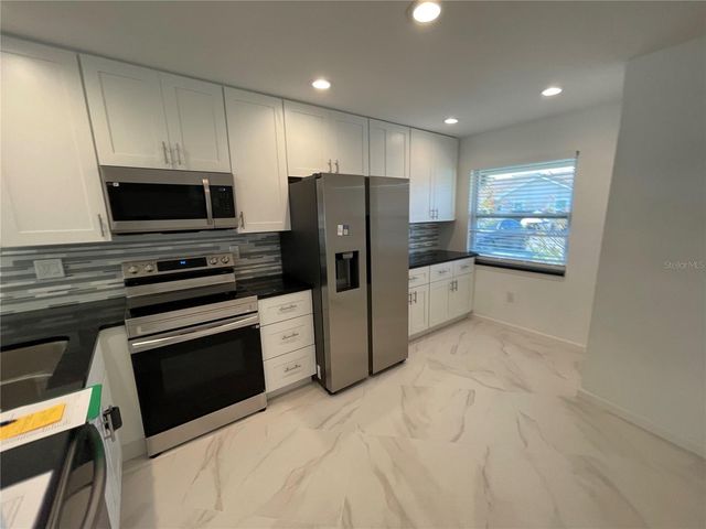 1865 ORANGE BOULEVARD WAY, Palm Harbor, FL 34683