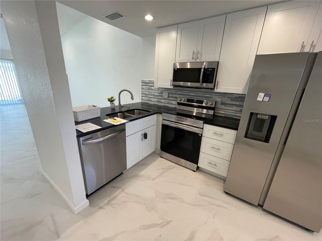 1865 ORANGE BOULEVARD WAY, Palm Harbor, FL 34683