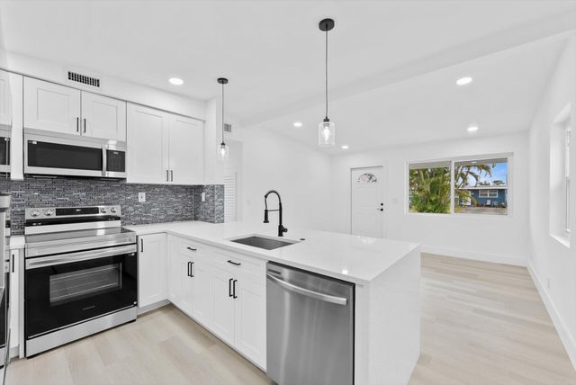 5737 Honeysuckle Drive, West Palm Beach, FL 33415