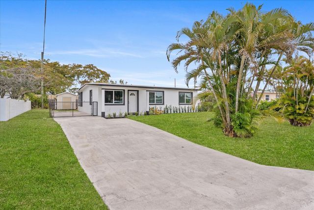 5737 Honeysuckle Drive, West Palm Beach, FL 33415