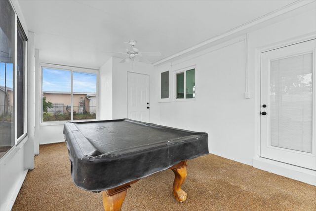 5737 Honeysuckle Drive, West Palm Beach, FL 33415