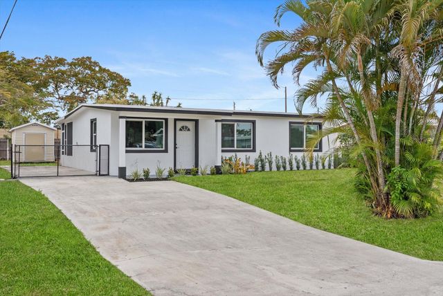 5737 Honeysuckle Drive, West Palm Beach, FL 33415