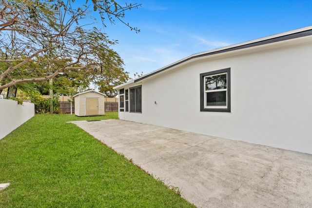 5737 Honeysuckle Drive, West Palm Beach, FL 33415