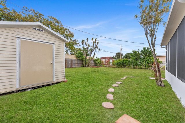 5737 Honeysuckle Drive, West Palm Beach, FL 33415