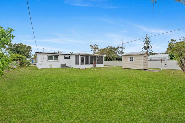 5737 Honeysuckle Drive, West Palm Beach, FL 33415