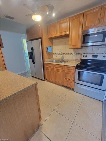 47 Tangelo CT, Lehigh Acres, FL 33936