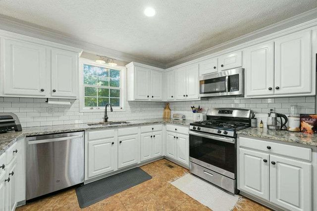 4957 HERITAGE CROSSING Drive, Powder Springs, GA 30127